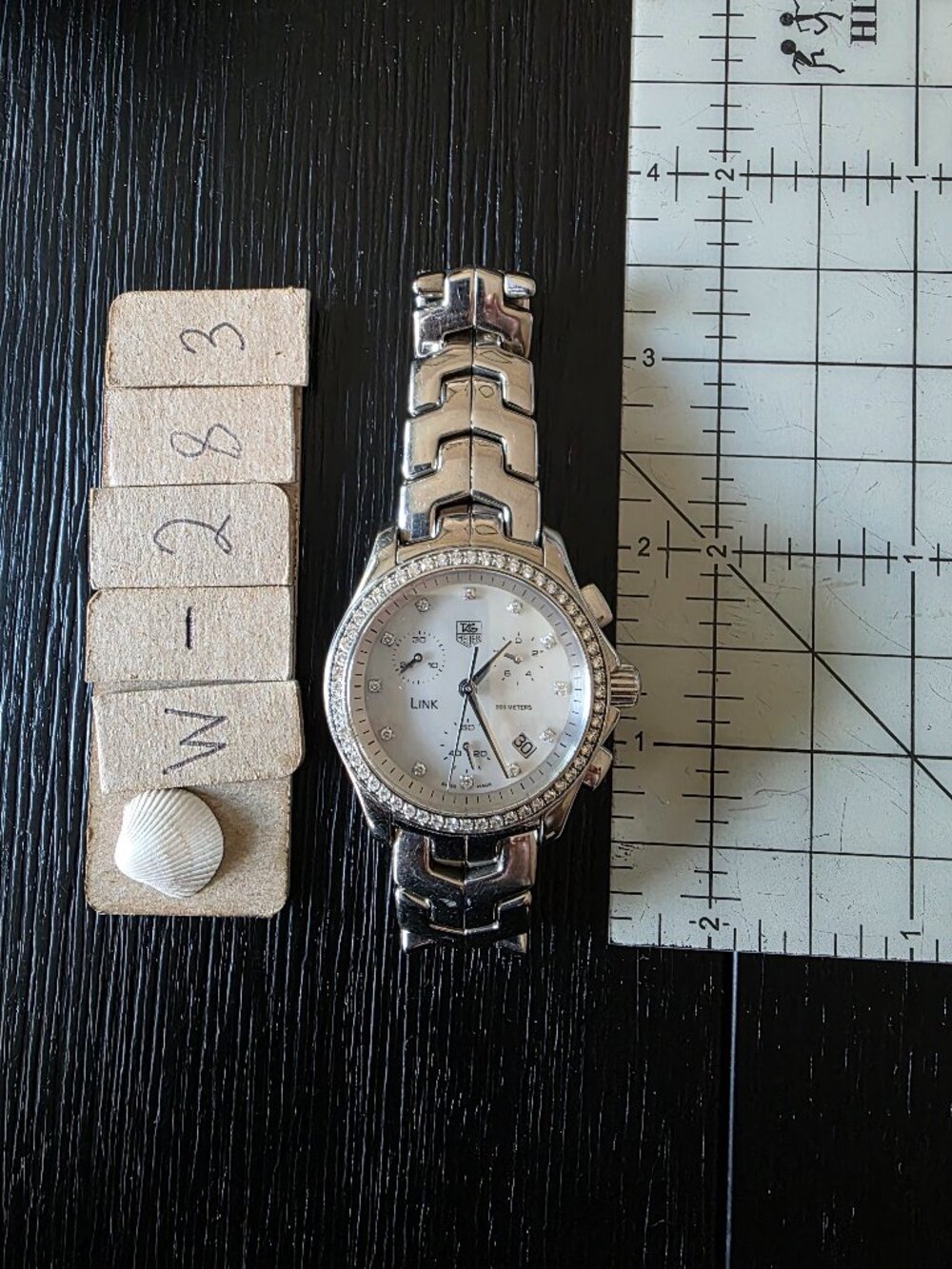 Item #W283 TAG Heuer Ladies 3 dial Diamond dial and bezel, mother of pearl face